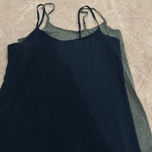 hey loves selling this pair of tank tops ! Let me know loves